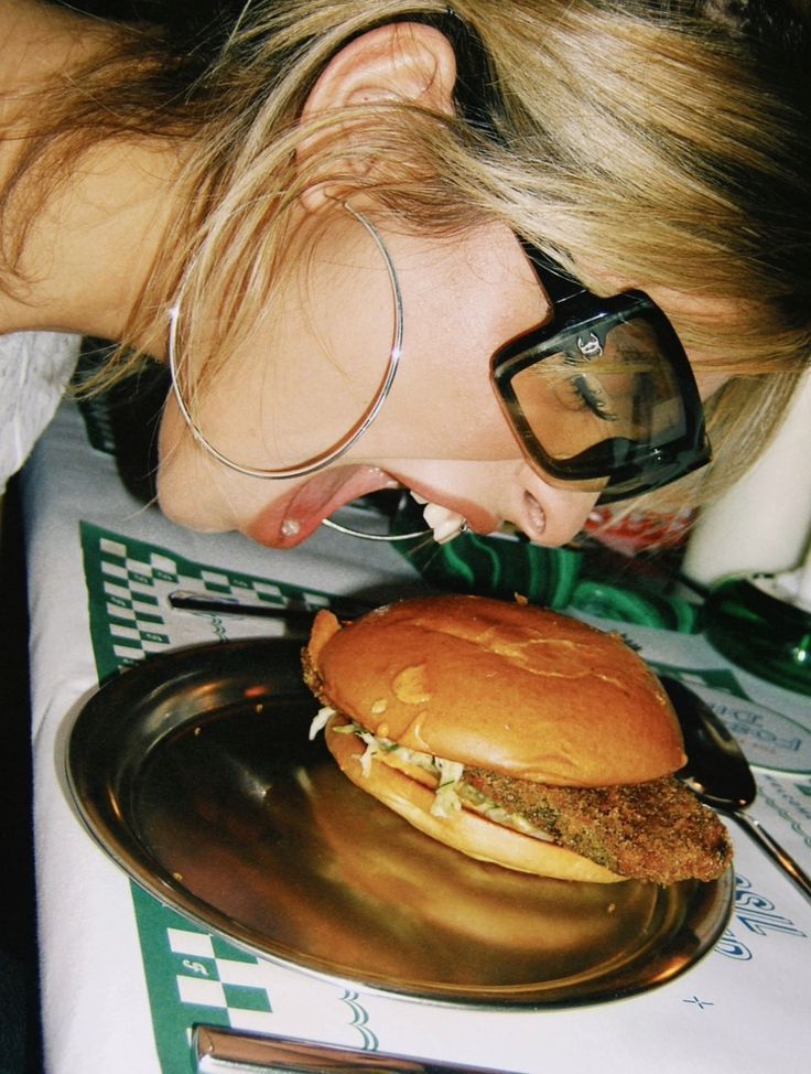 eating a burger in hotel